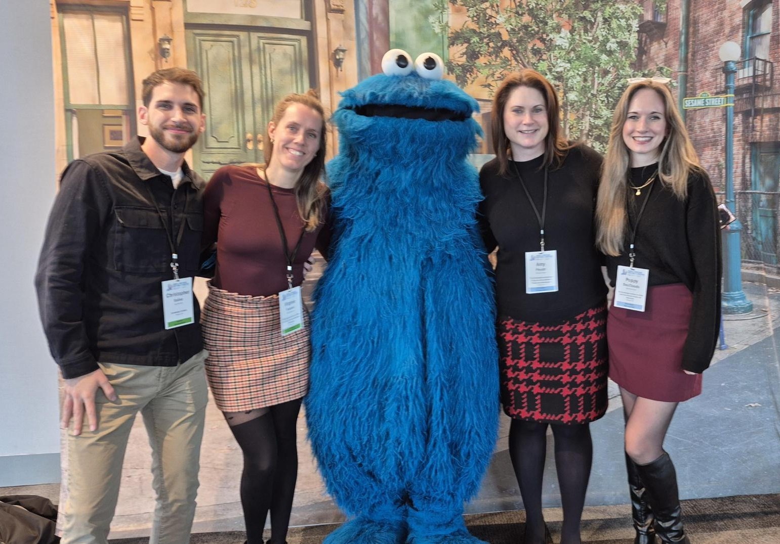 Knowledge Institute staff with Cookie Monster