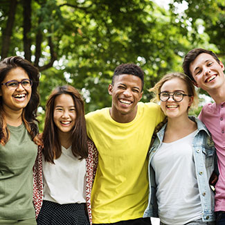 Six young people smiling