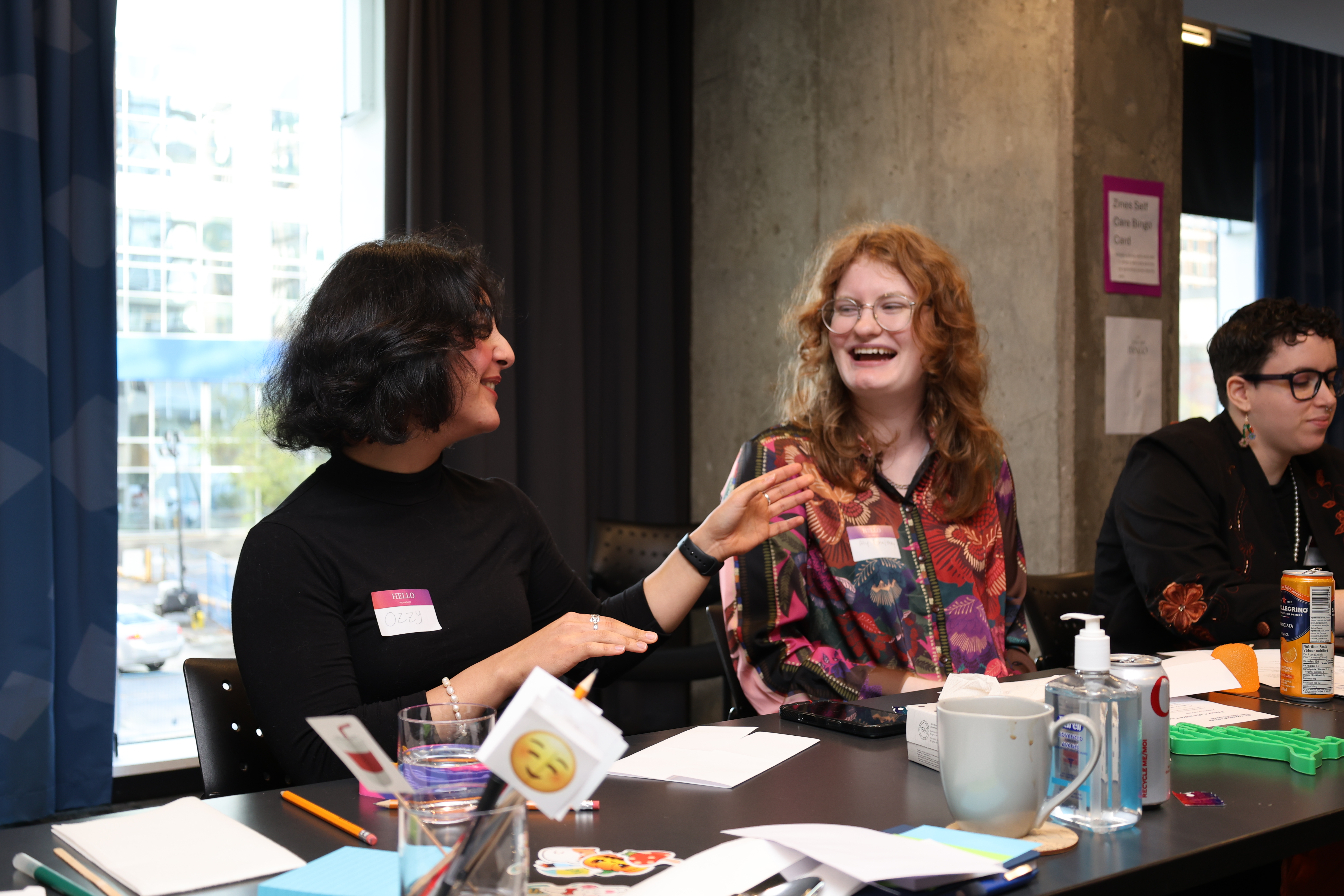 Two youth advisory members engaging